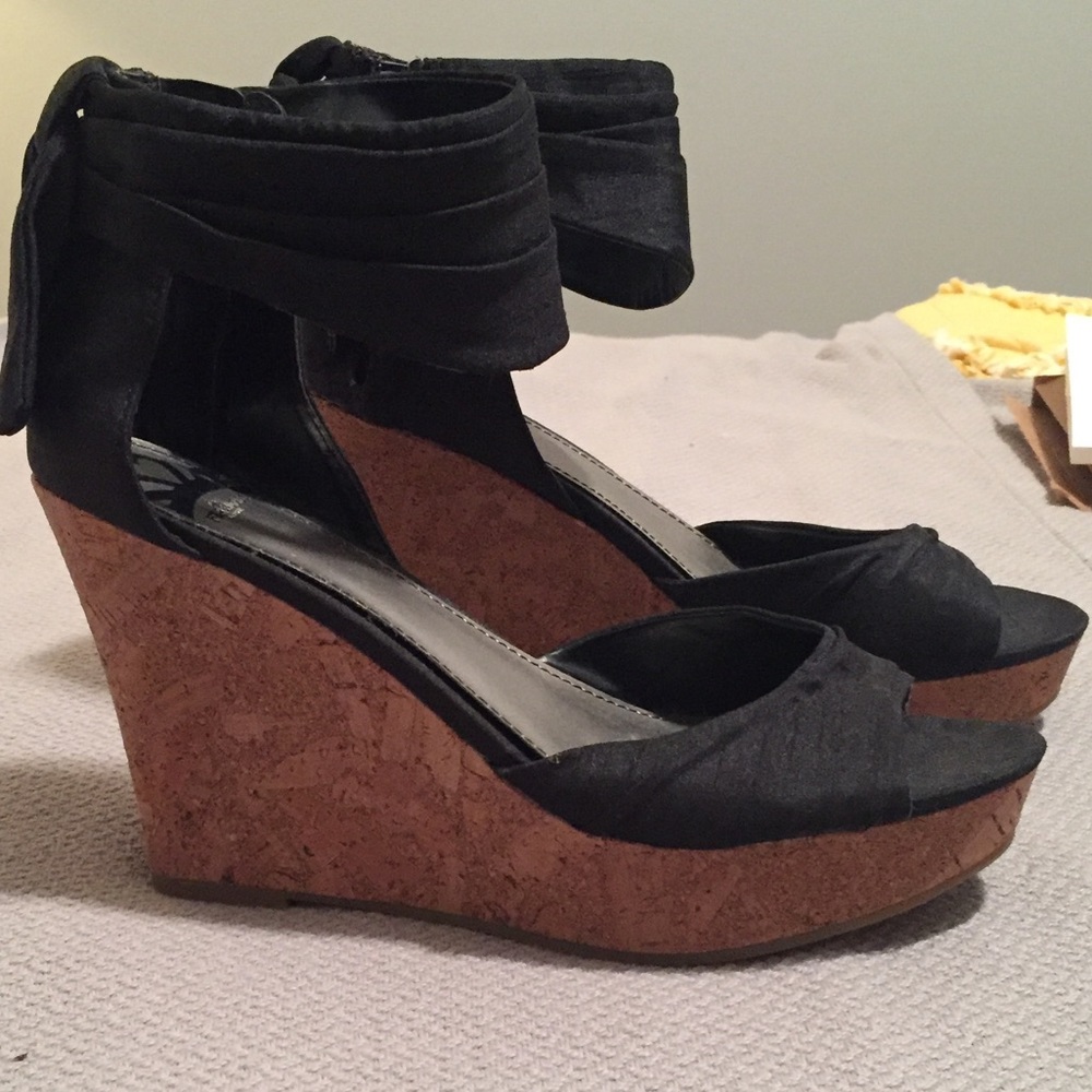 Black wedges with cork bottom.